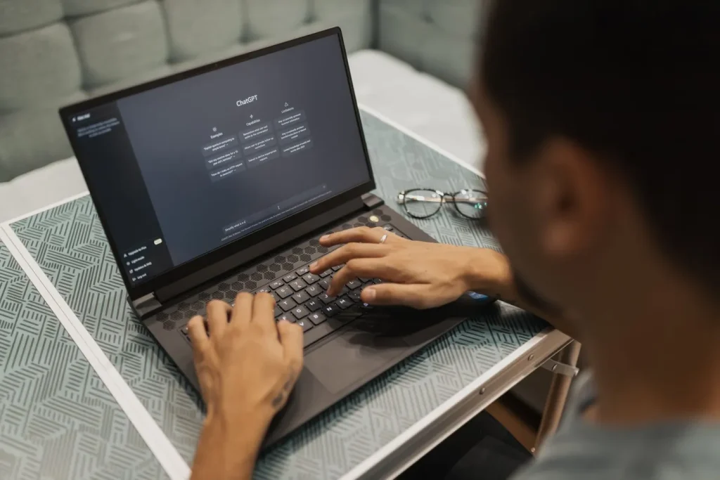Software engineering team reviewing code together in a modern office